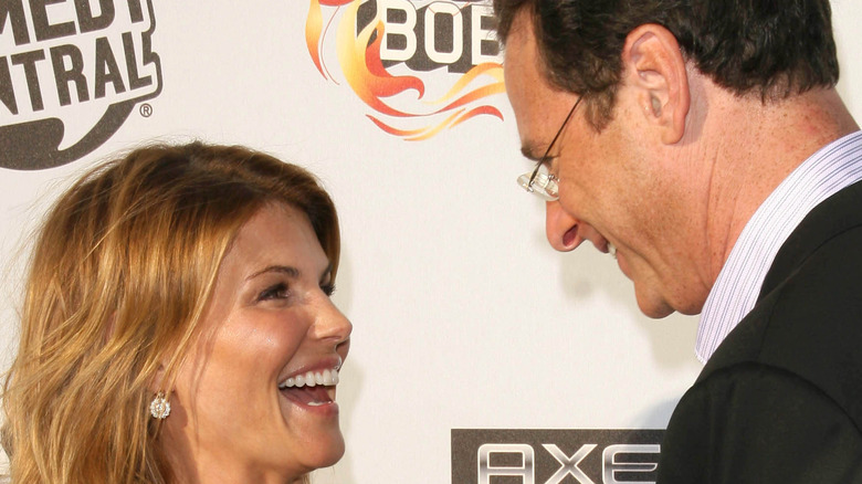 Bob Saget and Lori Loughlin laughing on red carpet