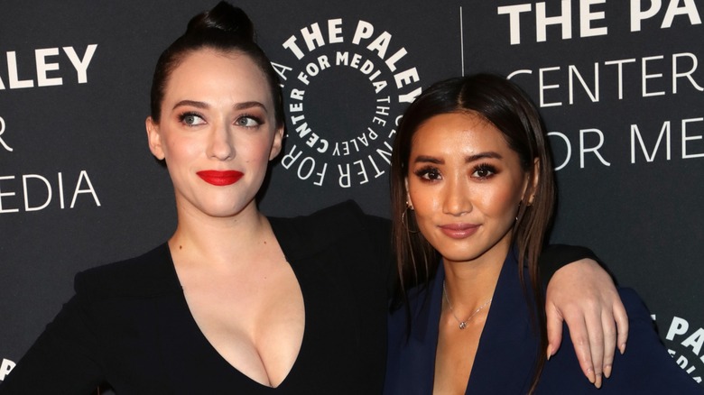 Kat Dennings and Brenda Song smiling