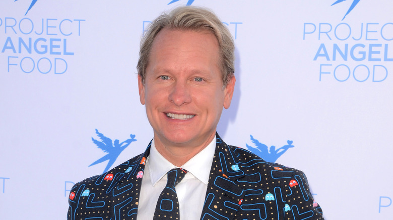 Carson Kressley smiling attending an event
