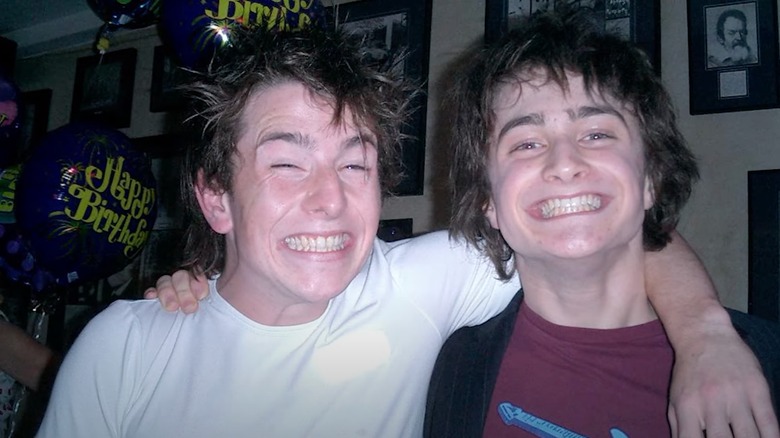 David Holmes and Daniel Radcliffe smiling