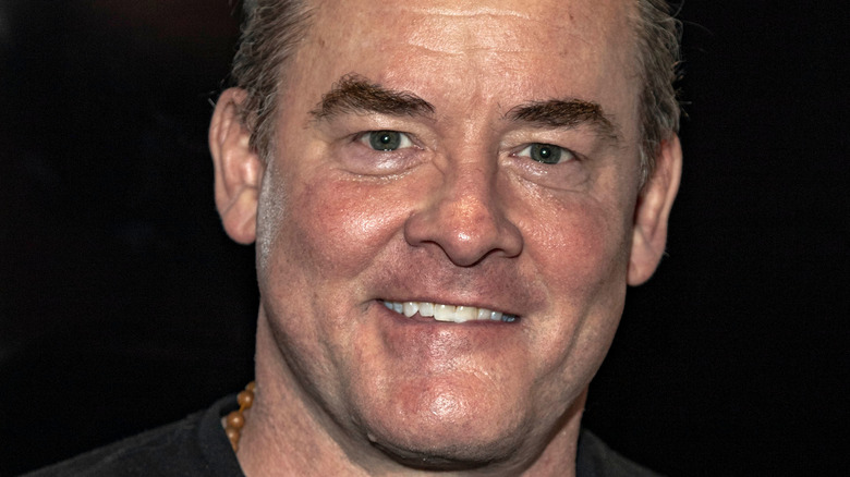 David Koechner smiling