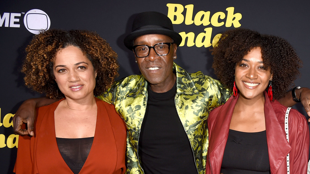 Bridgid Coulter, Don Cheadle, Imani Cheadle posing on red carpet
