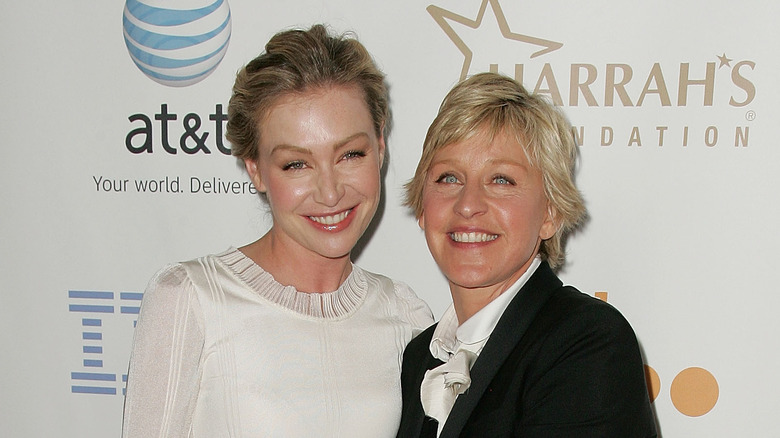 Portia de Rossi smiling with Ellen DeGeneres