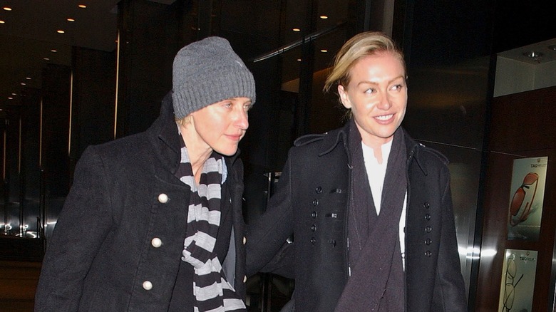 Ellen DeGeneres walking with Portia de Rossi