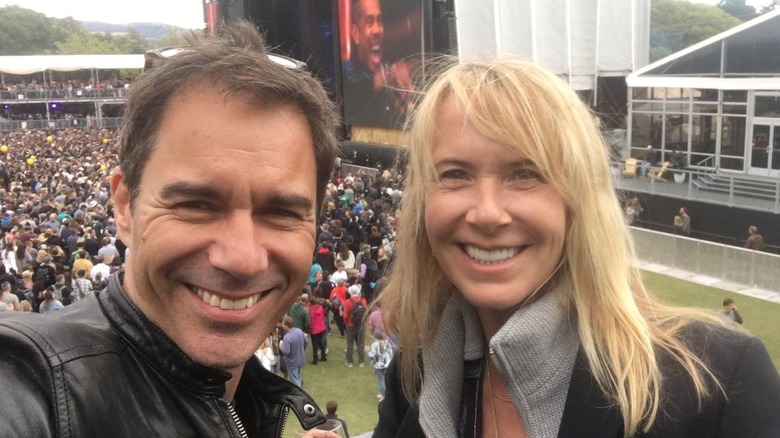 Eric McCormack and Janet Holden smiling