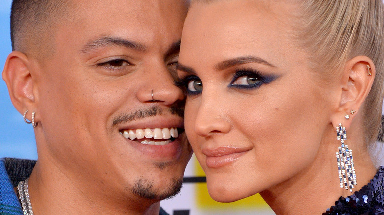 Evan Ross and Ashlee Simpson posing at an event
