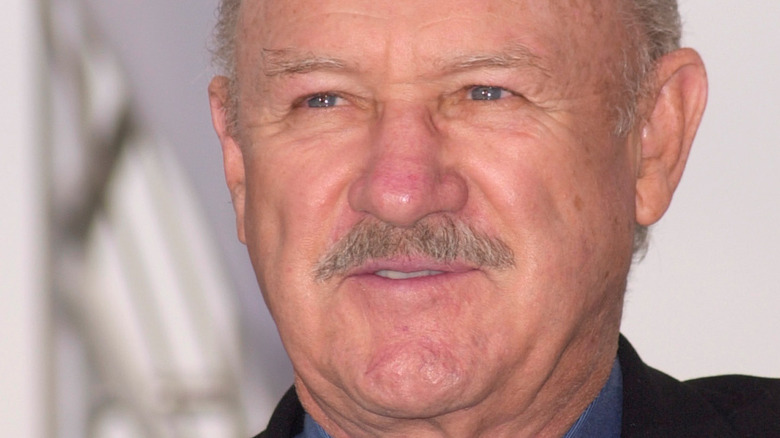 Gene Hackman smiling and looking away from camera