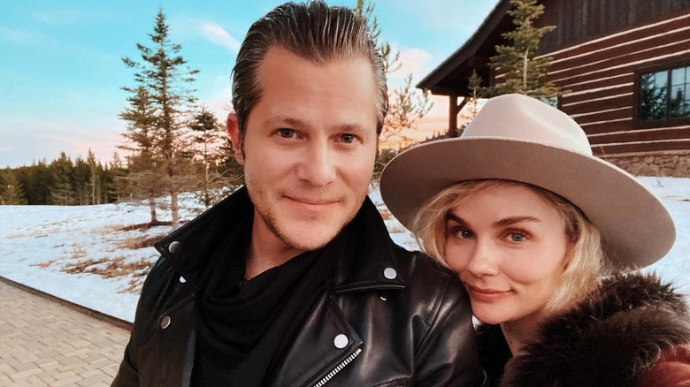 Clare Bowen in hat, Brandon Robert Young in leather