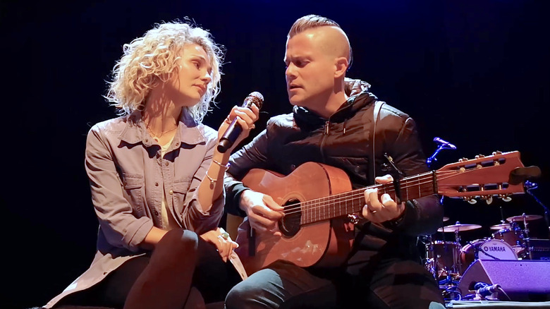 Clare Bowen and Brandon Robert Young performing on stage