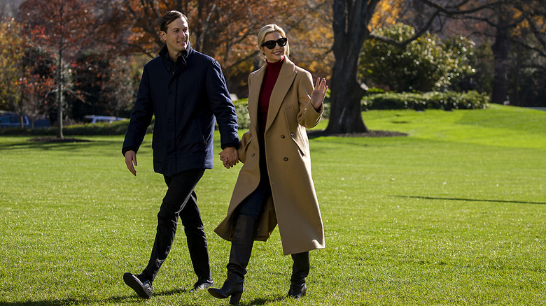 Jared and Ivanka waving outdoors