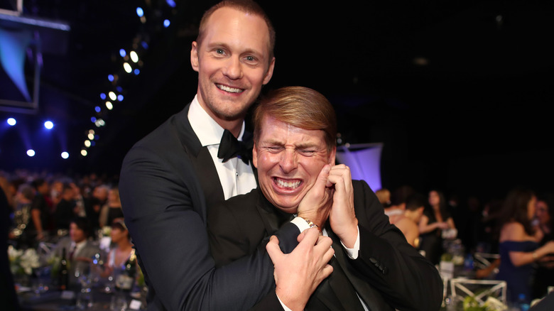 Alexander Skarsgard hugging Jack McBrayer