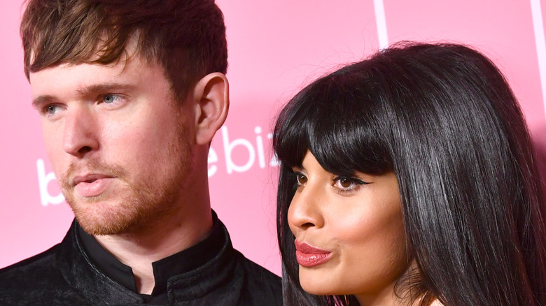 James Blake and Jameela Jamil posing