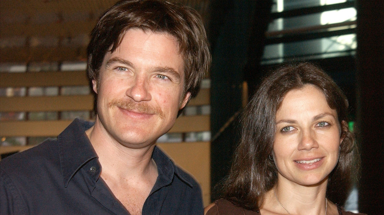 Jason Bateman in black shirt and Justine Bateman in brown top smiling