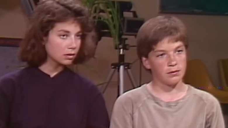 Justine and Jason Bateman being interviewed on a set