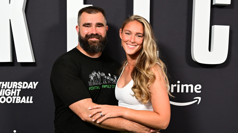 Jason and Kylie Kelce hugging and smiling