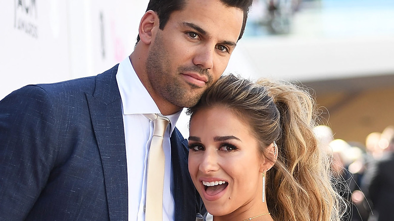 Jessie James Decker and Eric Decker pose for a photo