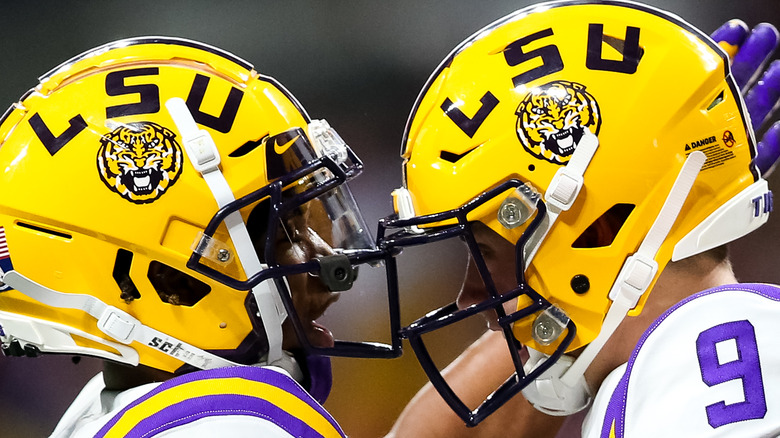 Joe Burrow and Ja'Marr Chase on the football field. 