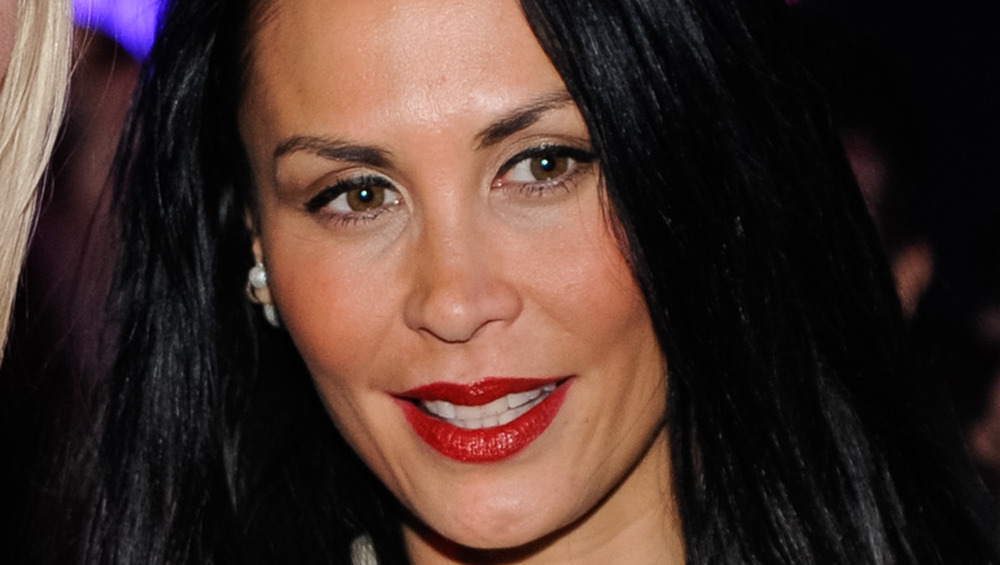 Jules Wainstein posing for press