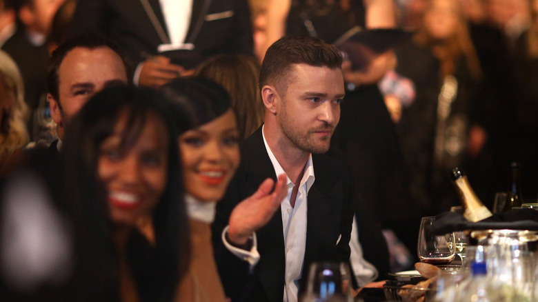 Justin Timberlake and Rihanna seated next to each other