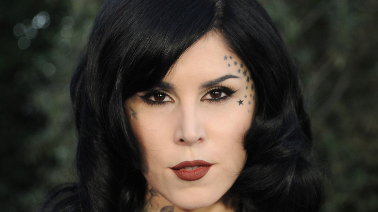 Kat Von D poses on the red carpet