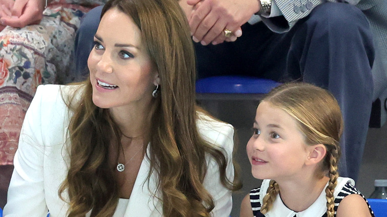Kate Middleton and Princess Charlotte in bleachers