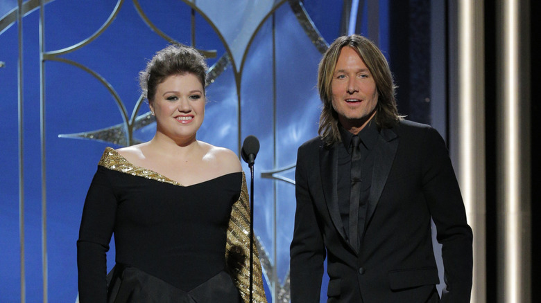Kelly Clarkson and Keith Urban presenting at the 2018 Golden Globes