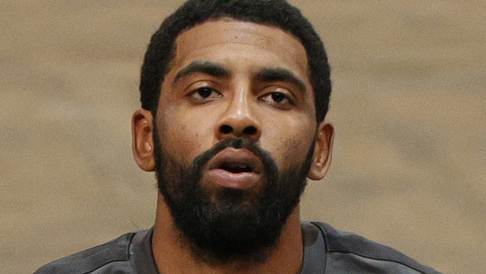 Kyrie Irving warming up