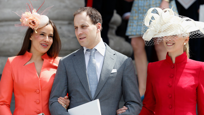 Sophie Winkleman, Frederick Windsor, and Gabriella Windsor walking