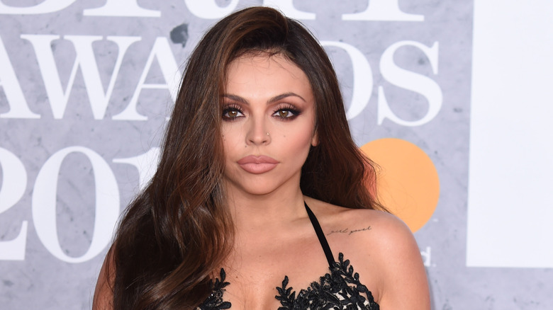 Jesy Nelson posing at an event