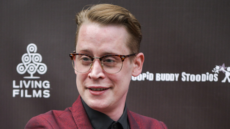 Home Alone star Macaulay Culkin smiling