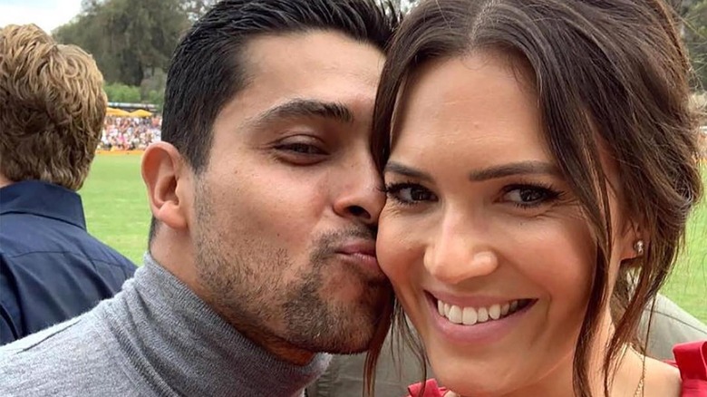 Mandy Moore and Wilmer Valderrama smiling