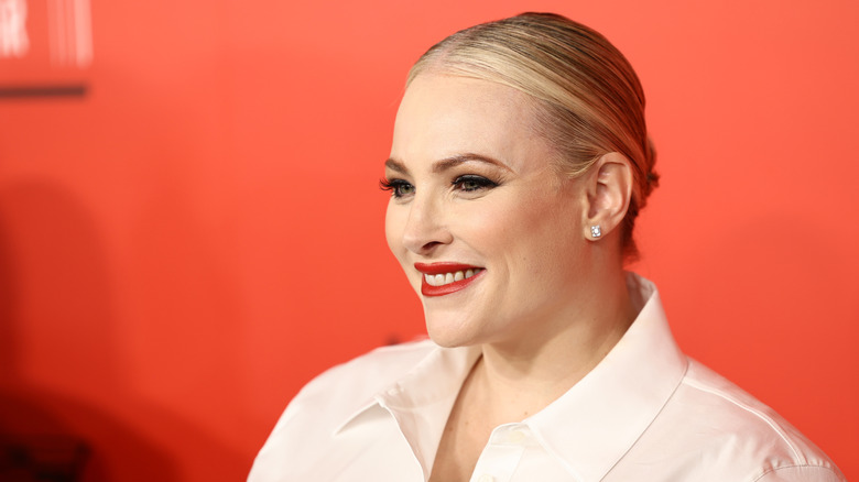 A side profile of Meghan McCain smiling