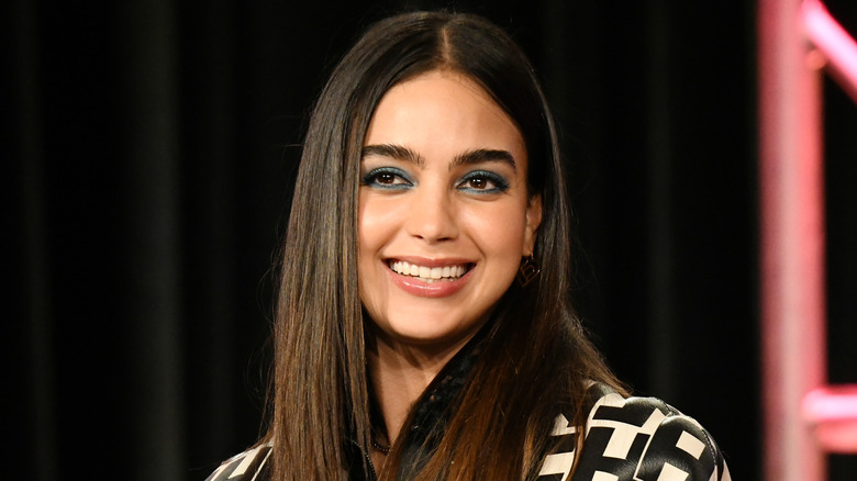 Melissa Barrera smiling on red carpet