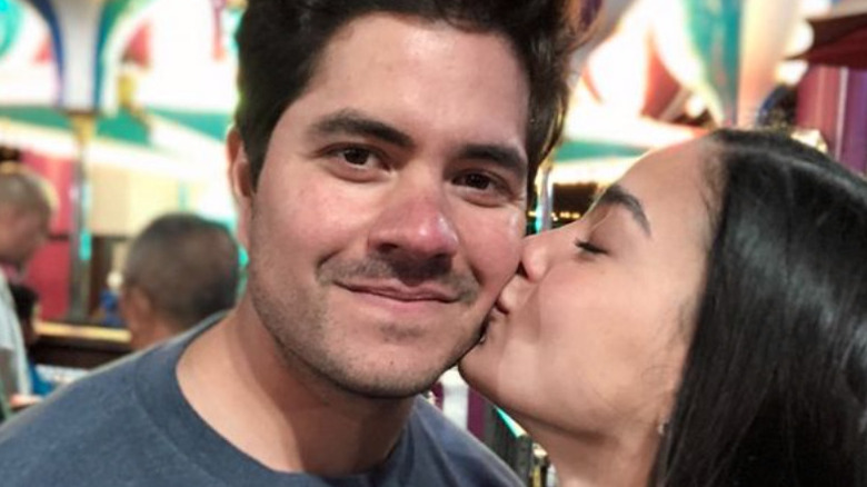 Melissa Barrera gives husband Paco Zazueta a kiss