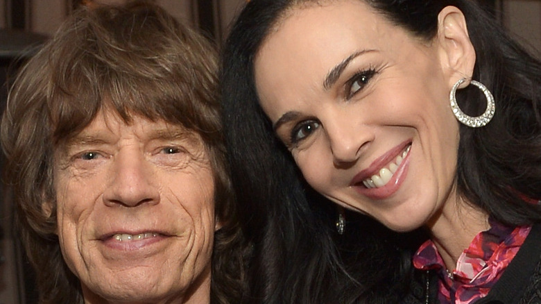 Mick Jagger & L'Wren Scott smiling