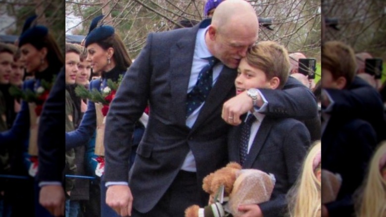 Mike Tindall embraces Prince George