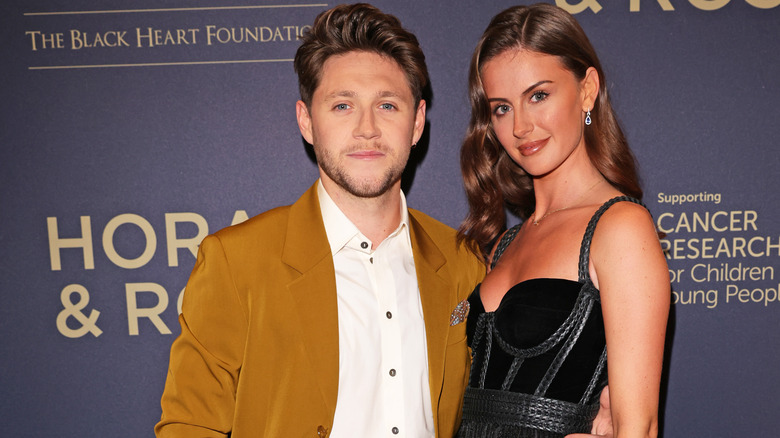 Niall Horan with Amelia Woolley at a red carpet