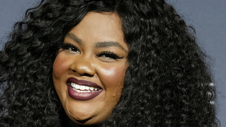 Nicole Byer smiling