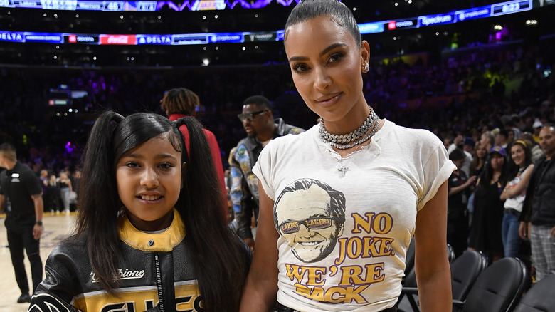 Kim Kardashian and North West smiling