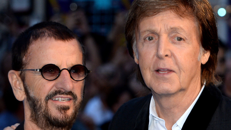 Ringo Starr and Paul McCartney pose for photographers