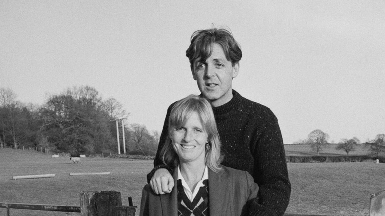 Paul and Linda McCartney in the countryside.