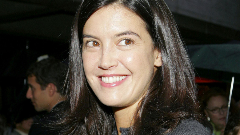 Phoebe Cates smiles for the camera.