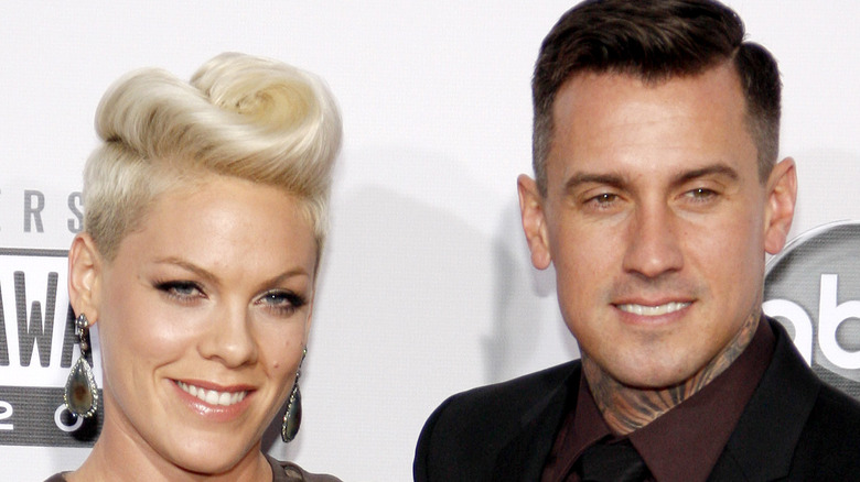 Pink and Carey Hart posing