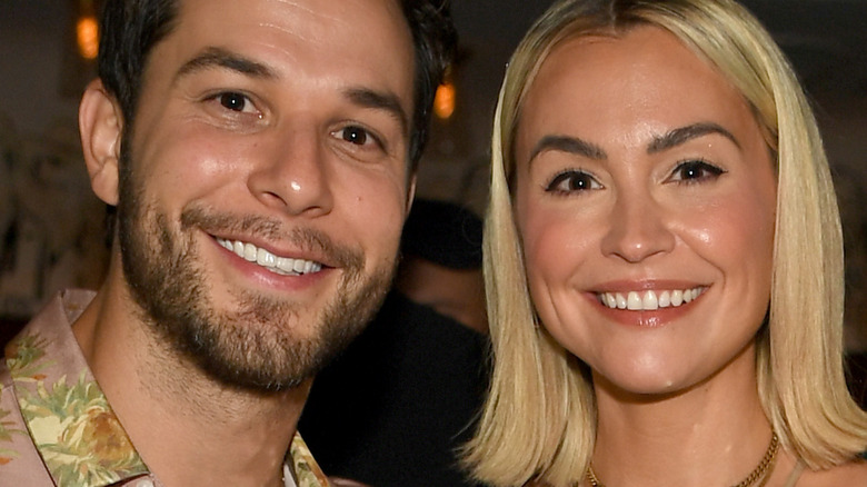 Skylar Astin and Lisa Stelly at event