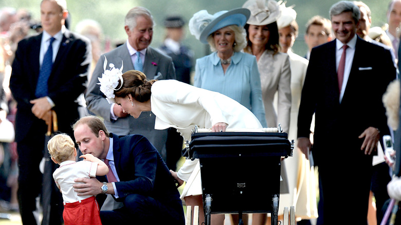 King Charles and Queen Camilla on the way to Princess Charlotte's christening