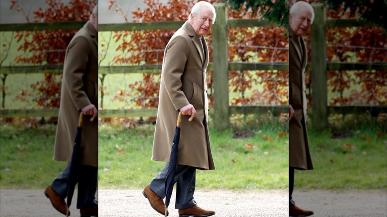King Charles walking the grounds of Sandringham