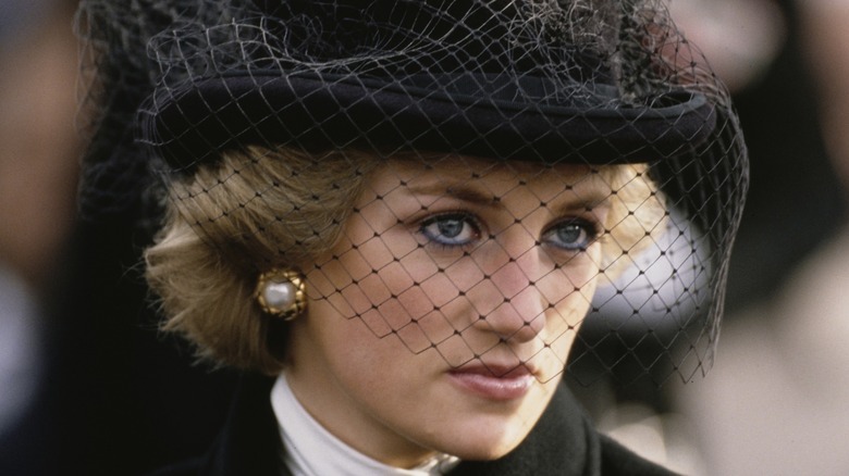 Princess Diana in a black hat