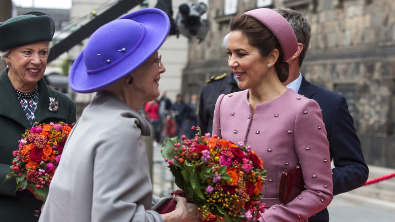 Queen Margrethe and Mary smiling