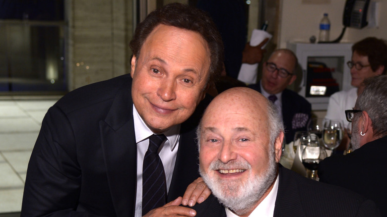 Actor Billy Crystal (L) and honoree Rob Reiner (R) smile at the 41st Annual Chaplin Award Gala dinner (2014)