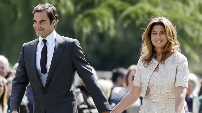 Roger and Mirka Federer walking